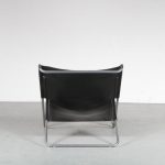m25015 1970s easy chair chrome metal frame with black neck leather upholstery Kwok Hoi Chan Spectrum NL