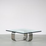 m26430 1970s Square coffee table on stainless steel base with thick glass top Francois Monnet Kappa, France