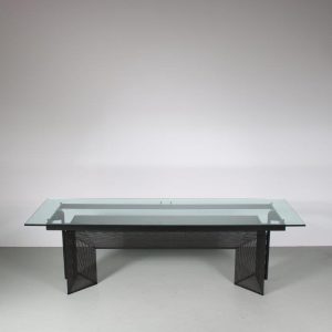 m26626 1980s "Tesi" dining table on black perforated metal base with glass top / Mario Botta / Alias, Italy