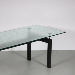 m26968 1980s Dining table LC6 on black metal base with blurred glass Le Corbusier Cassina, Italy