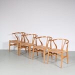 m26960 1970s Set of four oak wishbone dining chairs with rush seats Hans J. Wegner Carl Hansen, Denmark