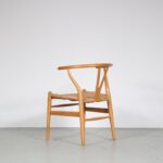 m26960 1970s Set of four oak wishbone dining chairs with rush seats Hans J. Wegner Carl Hansen, Denmark