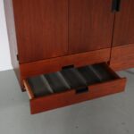 m27007 1950s Japanese series cabinet model CU04 in teak wood on black metal base Cees Braakman Pastoe, Netherlands