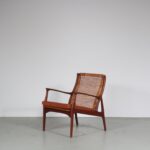 m26963 1950s Organic shaped teak easy chair with woven rattan back and new upholstered cushion Erik Andsersen Palle Pedersen, Denmark