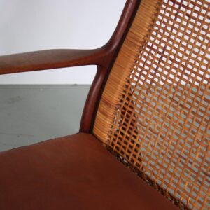 m26963 1950s Organic shaped teak easy chair with woven rattan back and new upholstered cushion Erik Andsersen Palle Pedersen, Denmark