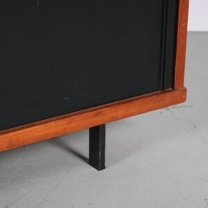 m27313 1960s Teak sideboard with two black laminated sliding doors and black metal legs Cees Braakman Pastoe, Netherlands